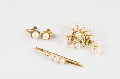Lot 1297 - A Chinese yellow metal pearl set brooch,...