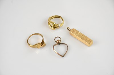 Lot 2110 - A yellow metal diamond set buckle ring,...