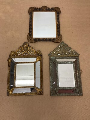 Lot 932 - Three mirrors, comprising two French brass...