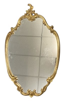 Lot 109 - A modern oval gilt framed wall mirror, 90 x 58cm.