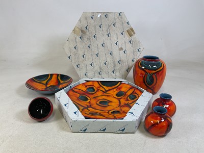 Lot 372 - POOLE POTTERY; a 'Peacock' pattern wall...