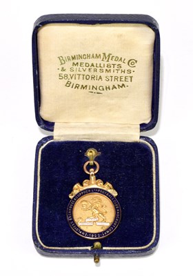 Lot 109 - A 9ct yellow gold and enamel fob medal for...