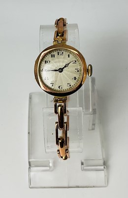 Lot 812 - A lady's vintage 9ct rose gold wristwatch,...