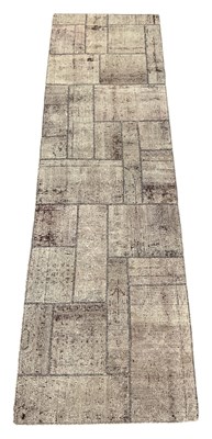 Lot 141 - A patchwork runner, 300 x 85cm.