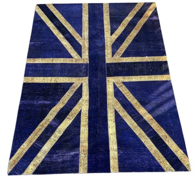Lot 130 - A modern machine made Union Jack rug, 299 x...