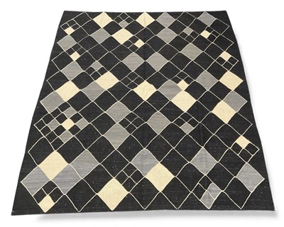 Lot 143 - A hand woven Beni Ourain kilim rug, the black,...