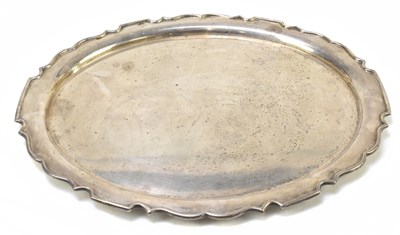 Lot 1066 - FRANK COBB & CO LTD; a George VI silver oval tray with piecrust border