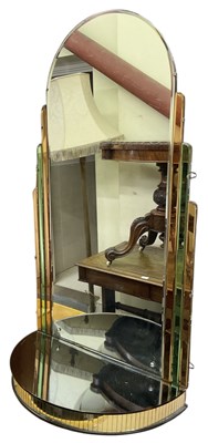 Lot 66 - An Art Deco dome topped long wall mirror, with...