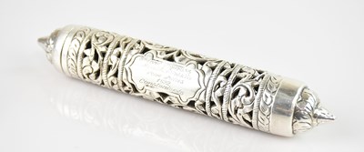 Lot 574 - A Middle Eastern white metal scroll holder...