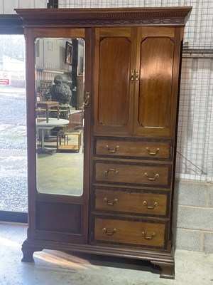 Lot 959 - An Edwardian mahogany combination wardrobe,...