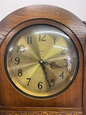 Lot 832 - An early 20th century oak longcase clock with...