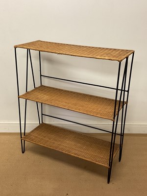 Lot 943 - A mid 20th century rattan and black metal...