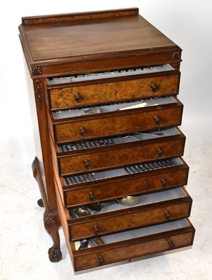 Lot 1038 - A walnut six drawer cabinet