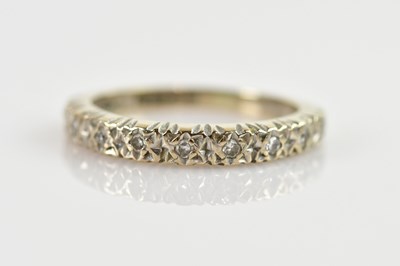 Lot 655 - A 9ct white gold dress ring, size H, approx 2.9g.