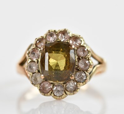 Lot 676 - A 9ct yellow gold and citrine dress ring, size...