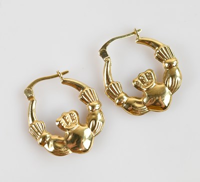 Lot 622 - A pair of 9ct yellow gold Claddagh hoop...