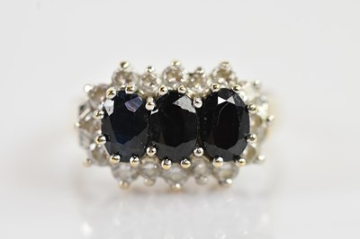 Lot 666 - A 9ct yellow gold dress ring, with three claw...