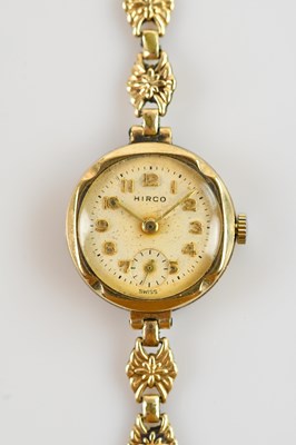 Lot 701 - HIRCO; a 9ct yellow gold lady's wristwatch, on...