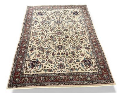 Lot 125 - A modern hand woven Persian style carpet, with...