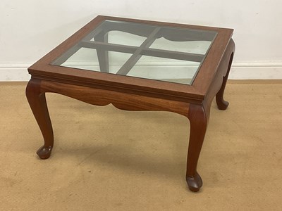 Lot 923 - A mahogany glass top square coffee table with...