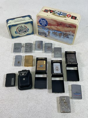 Lot 52 - A group of Zippo and similar lighters,...