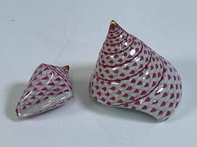 Lot 357 - HEREND; two conch shells, both with printed...