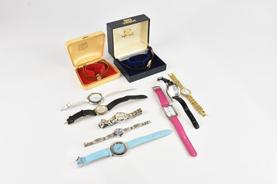 Lot 707 - A collection of fashion watches comprising...