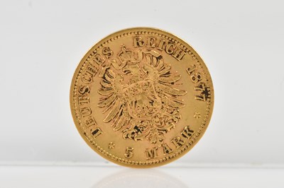 Lot 1011 - GERMANY; a five mark gold coin, 1877.