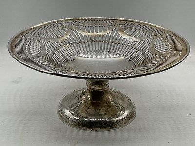 Lot 574 - A George V hallmarked silver pierced circular...