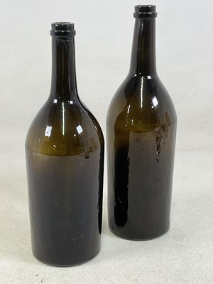 Lot 425 - Two 19th century hand blown brown/green tinted...