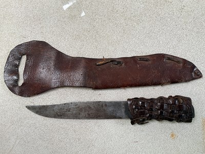 Lot 154 - A simple steel bladed knife, with plaited...