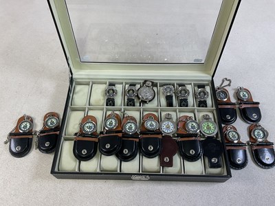 Lot 813 - A group of nineteen Hong Kong police watches,...