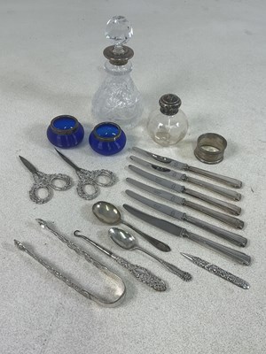 Lot 623 - A group of small silver and white metal...