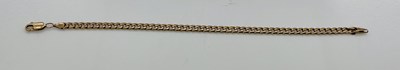 Lot 725 - A 9ct yellow gold curb link bracelet, length...