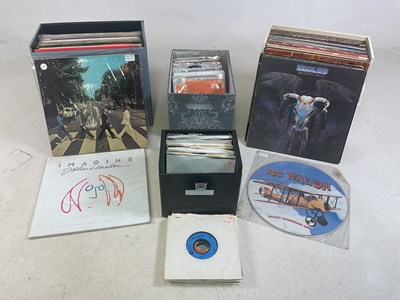 Lot 330 - A collection of albums and 7" inch records,...