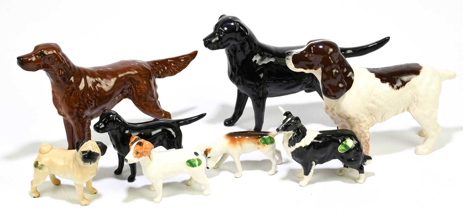 Lot 609 - BESWICK; a collection of eight dogs to