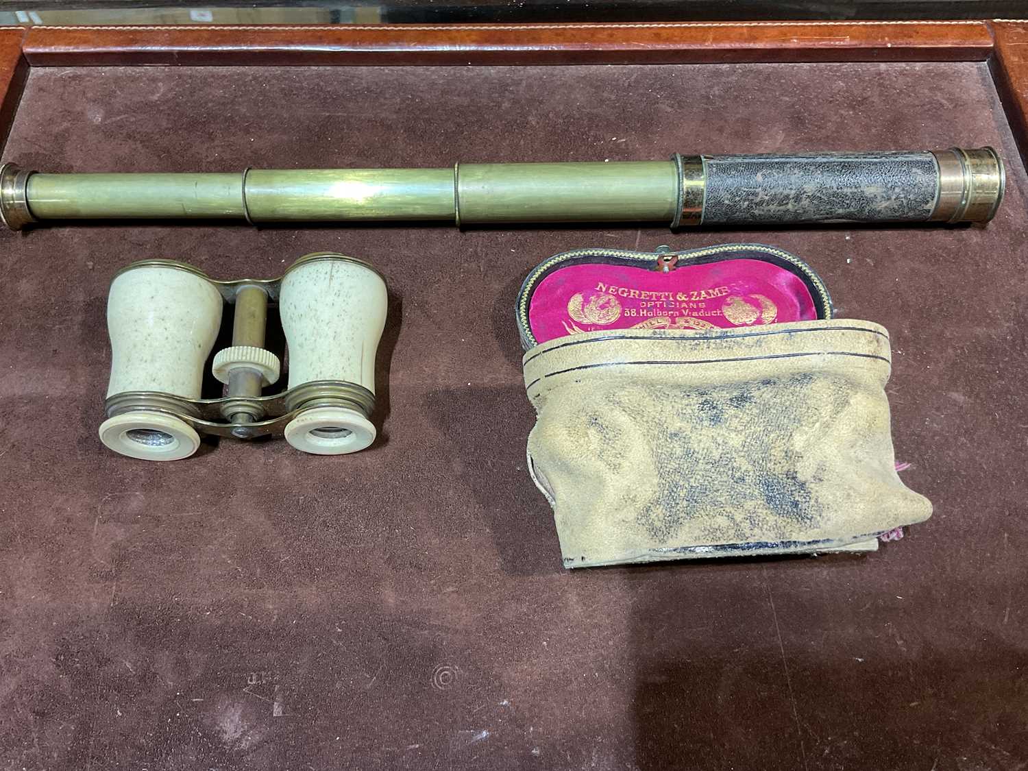Lot 30 Opera glasses in case and a small three
