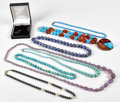 Lot 770 - A collection of turquoise beads, a pair of...