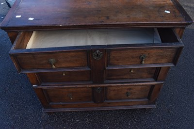 Lot 1511 - An 18th century and later oak chest of three...