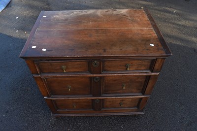 Lot 1511 - An 18th century and later oak chest of three...