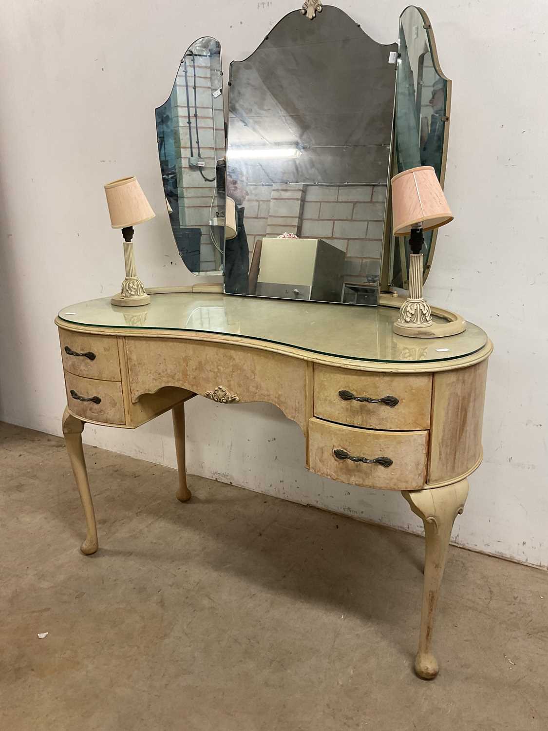 Lot 556 - A vintage grey kidney shaped dressing table...