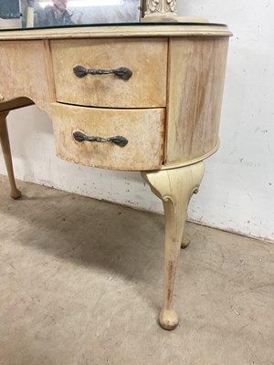 Lot 556 - A vintage grey kidney shaped dressing table...
