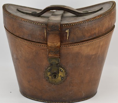 Lot 120 - A vintage stitched leather hat box by T. P....