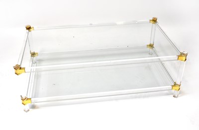 Lot 58 - ATTRIBUTED TO PIERRE VANDEL; a Lucite two-tier...