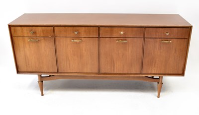 Lot 63 - A 1970s vintage teak-effect sideboard...