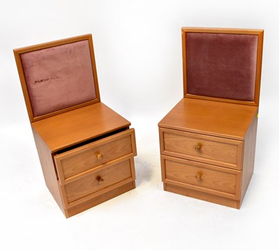 Lot 73 - G-PLAN; a pair of two-drawer bedside tables...