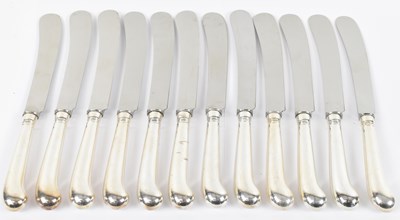 Lot 762 - A set of twelve knives with hallmarked silver...