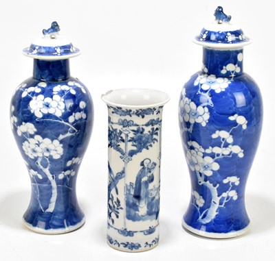 Lot 636 - Two Chinese blue and white vases with covers