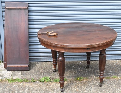 Lot 90 - A Victorian mahogany circular wind-out dining...