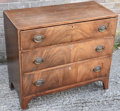 Lot 88 - A 19th century mahogany chest of three long...